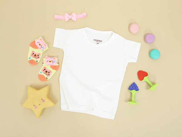 babys white onesie and pink and white bear print onesie